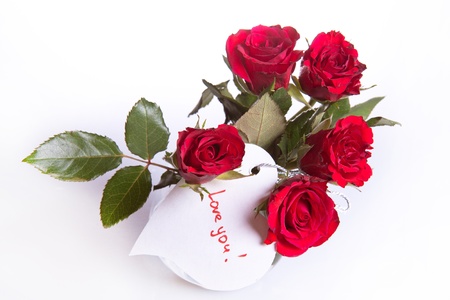 bunch of red roses with white heartの写真素材