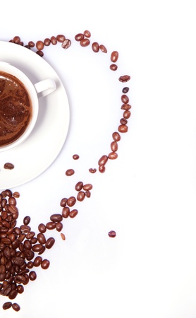White cup of black coffee with coffee beans as half of heart over whiteの写真素材