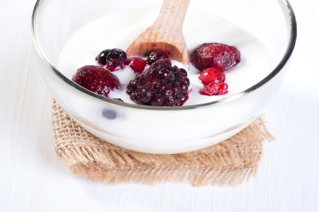 bowl with Yogurt and mix of fresh berriesの写真素材