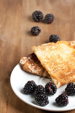 Plate of pancakes with fresh blackberriesの写真素材