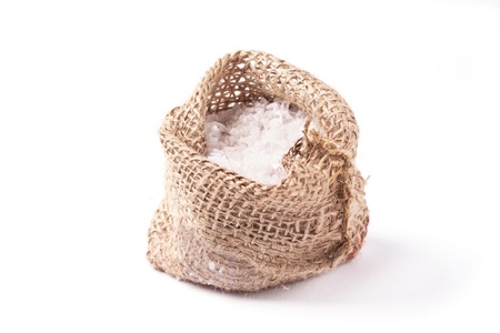 Sack of sea salt over whiteの写真素材