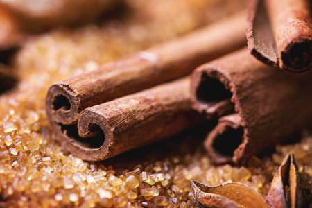 Spices cinnamon over heap of brown sugar. See seriesの写真素材