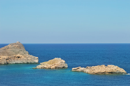 Seaview with rocks in sunny day, Rhodes, Greece