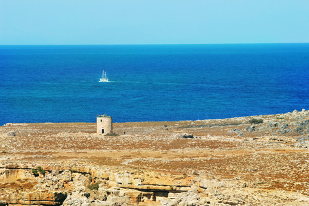 Seaview with old tower in sunny day, Rhodes, Greeceの写真素材