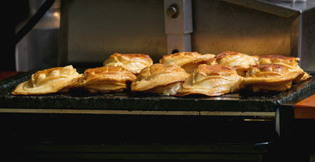 Street food at Prague market. Tranitional czech grilled beer cheese.
