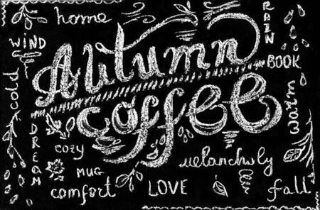 Autumn coffee chalk lettering on chalkboard. Top view. Autumn drink cafe conceptの写真素材