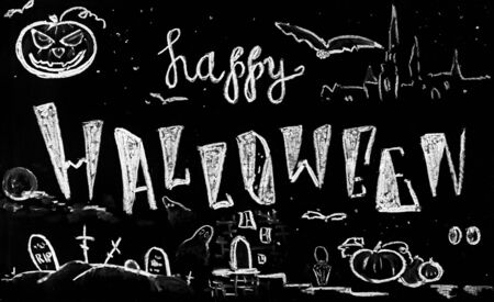 Chalkboard with Happy Halloween hand lettering and drawings of pumpkins, ghosts, cemetery and bats. Autumn Halloween holidays decorations.の写真素材