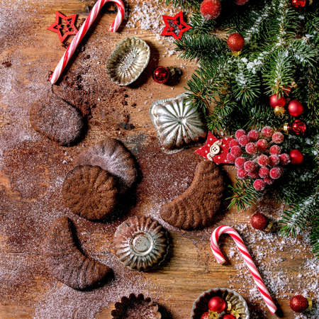Homemade traditional Christmas shortcrust cookies chocolate crescents with cocoa icing sugar with...