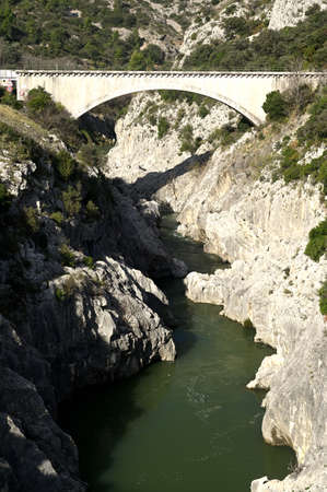 The Pont du Diable in Saint Guilhem le desertの写真素材