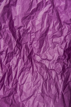 Backdrop canvas of seamless empty wrinkled purple paperの写真素材
