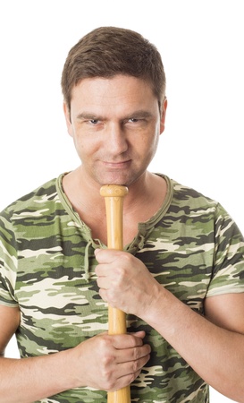 Handsome adult male in camouflage clothes with baseball bat isolated on white background