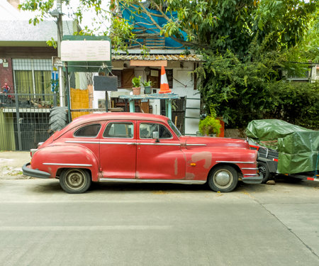 Vintage red American car in the streets of Montevideo, Uruguayの写真素材