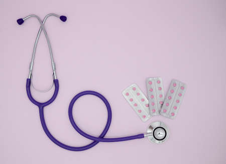 Stethoscope, three blisters with pink medical pills on pink background with copy space. Medical flat lay.の写真素材