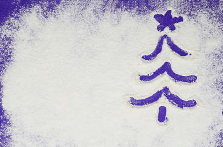 Christmas tree in purple on white background. Winter flour background. Color of the Year 2022 Velvet violet.の写真素材