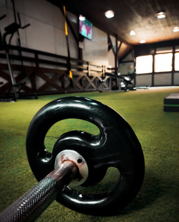 Closeup shot of a kettlebell in a gym with a blurred backgroundの写真素材