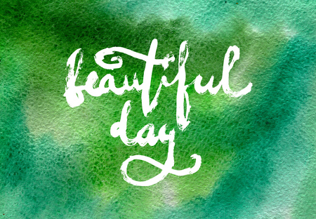 Hand painted brush lettering on abstract colorful watercolor background. Hand lettering and custom typography for your designs: t-shirts, bags, for posters, invitations, cards, etc.の写真素材