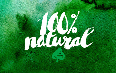 100 percents natural grunge label on abstract colorful watercolor backgroundの写真素材
