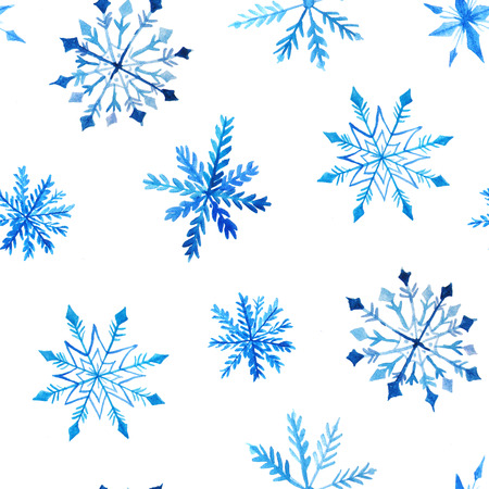 Seamless pattern with watercolor hand painted  tracery snowflakes. Bright winter holiday background. Perfect for textile fabric, decorative paper or website wallpaperの写真素材