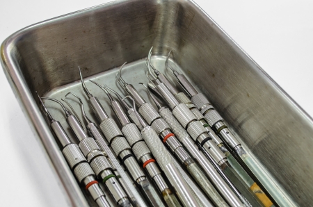 Set of dental tools on stainless steel trayの写真素材