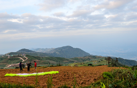 PHETCHABUN,THAILAND - December 05  Prepare the equipment and body for play paramotor on December 05,...