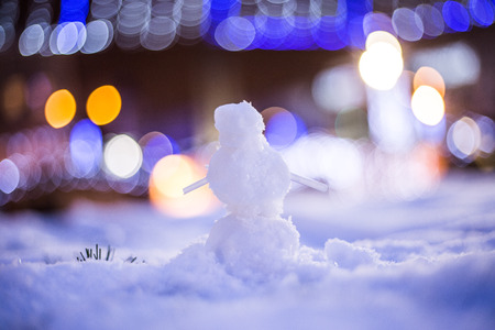 Snowman and light bulbsの写真素材