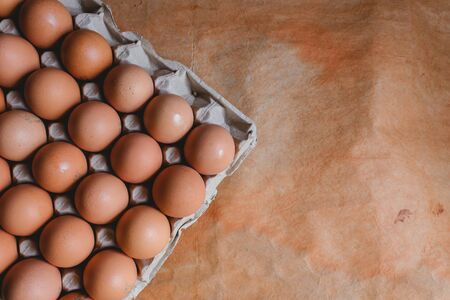 Eggs in carton box on rustic background, bogota colombia, april 4, 2020