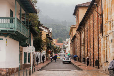 Streets of La Candelaria neighborhood, with buildings from the colonial era, important tourist site of the city, BogotÃ¡ Colombia July 6, 2022のeditorial素材