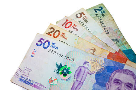 Colombian peso bills of 2000 5000 1000 2000 and 50000 pesos on white background, August 6, 2022の写真素材