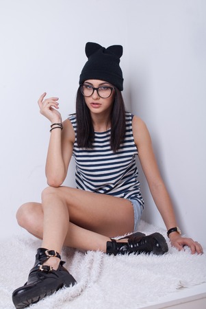Brunette cheerful young woman. Beauty portrait, perfect makeup. Long chic elegant hair. Model tests.の写真素材