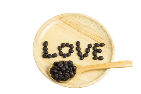 coffee bean love word in wood plate, clipping pathの写真素材