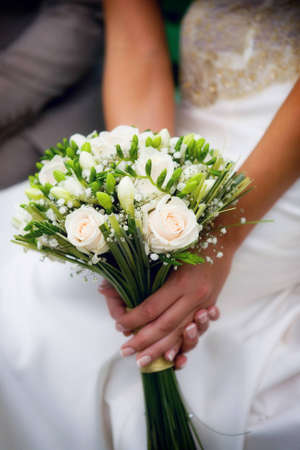 Bridal bouquet in the hands of the brideの写真素材