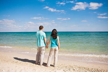 A couple hugging on beachの写真素材