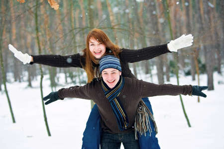 Young couple in love smiling in winter
