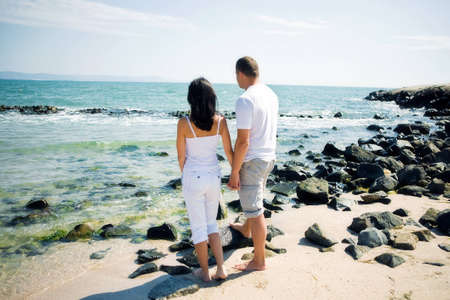 A couple hugging on beachの写真素材