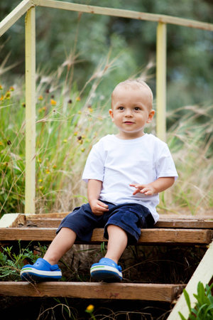 A child in the gardenの写真素材