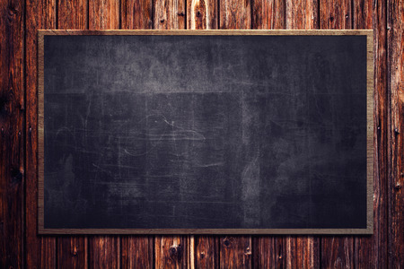 Blackboard on wooden Backgroundの写真素材
