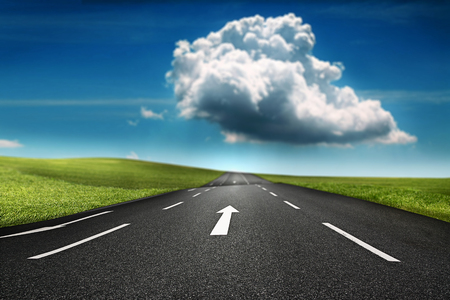 Big cloud in the horizon of a freewayの写真素材