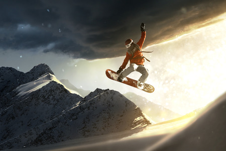 Snowboarder at Sunsetの写真素材