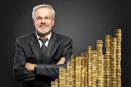 Earnings coins graph going upの写真素材