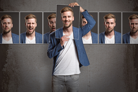 Man shows different emotionsの写真素材