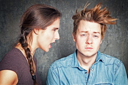 Woman is yelling to a boyの写真素材