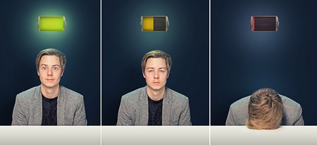 Battery depleted young manの写真素材