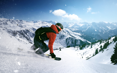 Skier goes downhillの写真素材
