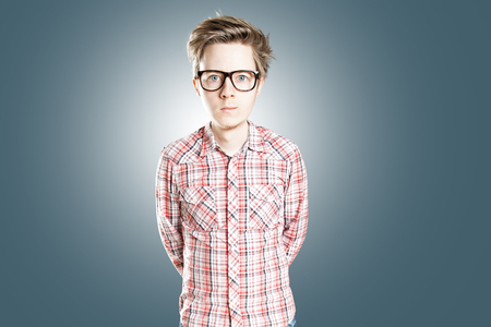 Nerdy boy with glassesの写真素材