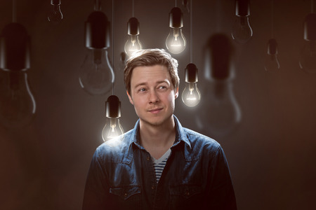 man with Idea light bulbsの写真素材