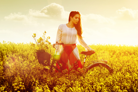 Girl in a field of flowersの写真素材