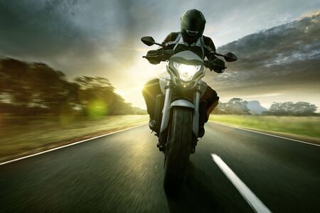 Motorbike on a country roadの写真素材