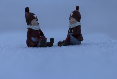 Some figures sitting in the frosty winter sceneの写真素材