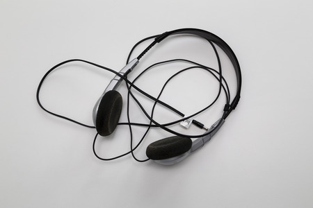 A pair of headphones for connection to a music player or phoneの写真素材