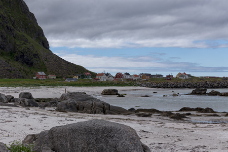 A collection of buildings in the background of a beachの写真素材